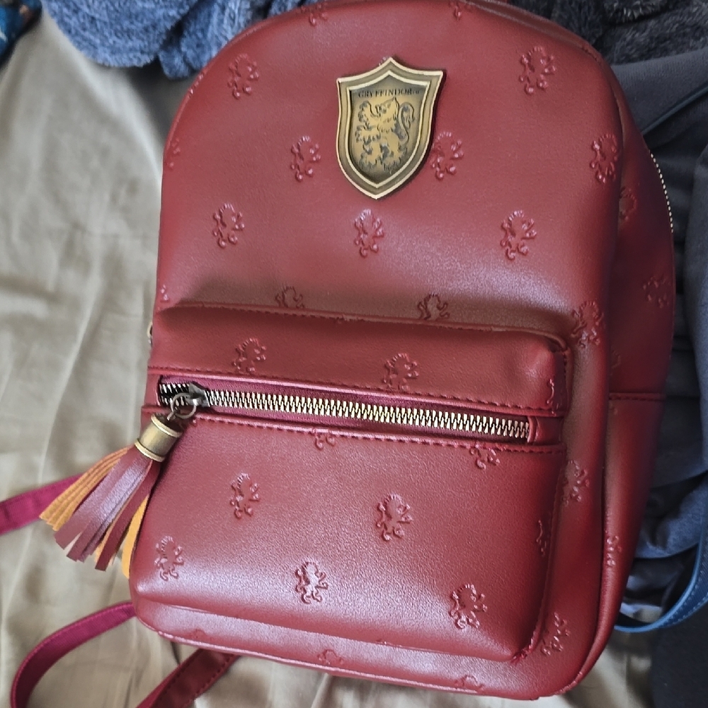 Red Embossed Backpack with Tassel